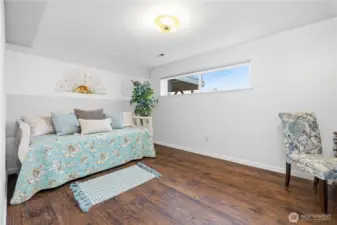 Lower-level bedroom w/desk alcove.