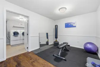 Home gym that could be converted into a secondary kitchen for multi-generational living.