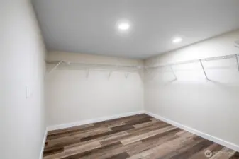 extremely large walk in closet in primary bedroom