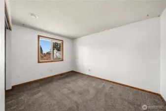 Bedroom no. 1 located on upper level.