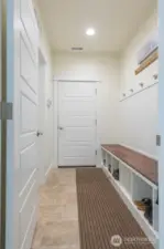 Mudroom through to Garage, Washer & Dry are in their own room to the left