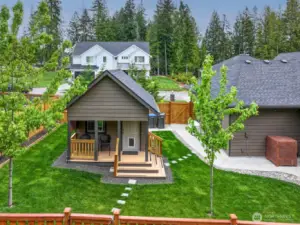 Studio with fenced side yard