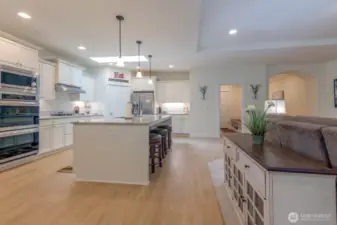 Open Kitchen -Double Ovens, natural gas cooktop, SS Appliances and a Pantry