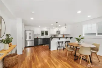 The open concept room has plenty of space for a dining table