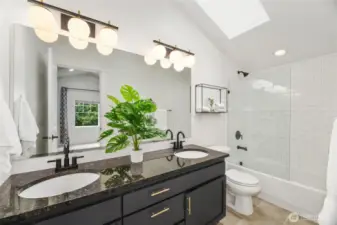 Designer updated 4 piece bath w/skylight