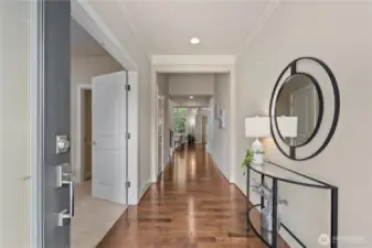 Grand entry upgrades with hardwood floors on the main level