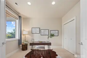 Main floor bedroom/office or flex space with attached 3/4 bathroom