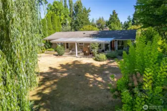 Large grassy yard and mature landscape offer tons of privacy!