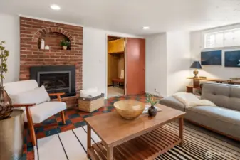 Lower level rec room with gas fireplace.