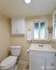 Downstairs 3/4 bath with shower to the back