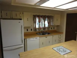 Huge kitchen with eating bar.