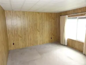 Very large living room running full length of side.