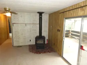 Family room with gas wood stove.