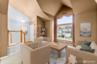 Formal living room with vaults that add visual interest