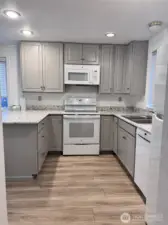 Unit 12722 - Kitchen cabinets were pained, new flooring