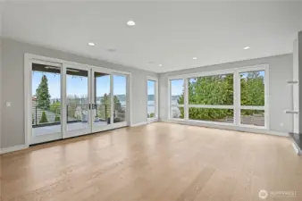 Elevated living framed by serene water views.