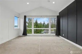 Welcome to the luxurious primary suite—a serene retreat designed for comfort, style, and relaxation.