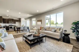 Open great room concept next to your kitchen. Photos are for representational purposes only.  Colors and finishes may vary.