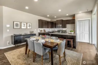 The Wellington has a breakfast bar and dining area. Photos are for representational purposes only.  Colors and finishes may vary.