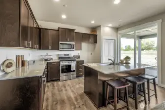 This home will have WHITE cabinets thru out. Photos are for representational purposes only.  Colors and finishes may vary.