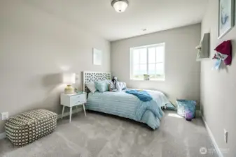 1 of 4 generous secondary bedrooms. Photos are for representational purposes only.  Colors and finishes may vary.