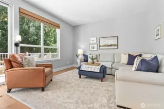 Living room right off kitchen overlooking the backyard