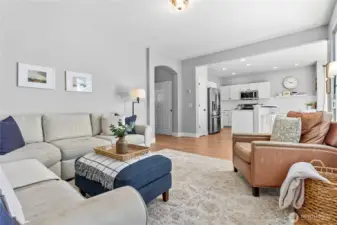 Living room right off kitchen overlooking the backyard