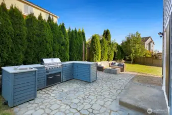 Amazing backyard with Built in BBQ area and Fire pit waiting for you to relax and enjoy!