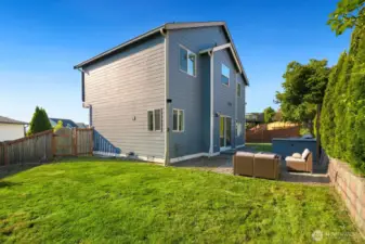 Plenty or room to play on this level fully fenced back yard.