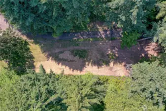 An aerial view of a small portion of the fenced pasture area.