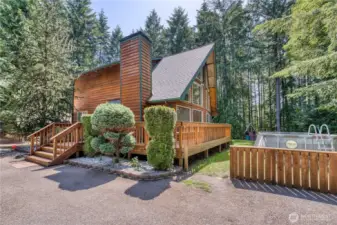 Home sites nicely on nearly 2.5 acres for optimal privacy and has a wrap around porch.