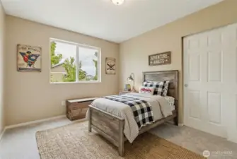 Guest bedroom 2 virtually staged with a farmhouse look