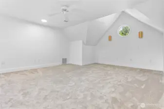 The pictures don't do this room justice. It's HUGE and could be used as a second living room, additional bedroom, limitless potential.