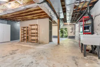 This space could easily be divided into storage/utility space and another living space that can be accessed from either inside the home or through the sliding doors through the side yard.