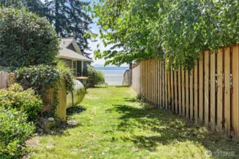 The community easement that leads directly to the beach is about a two-minute walk from the house.