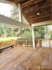 This partially covered back deck can extend your year-round use of the outdoors.