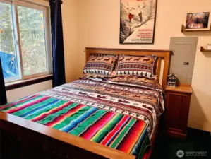 Primary bedroom on main floor with ensuite full bathroom