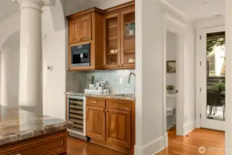 Wet bar at Kitchen with wine cooler and built-in espresso machine!