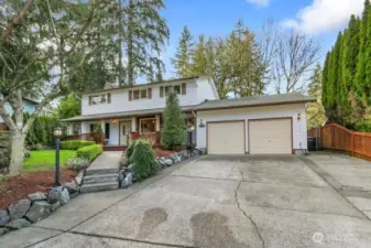 The large driveway offers plenty of additional parking and No HOA!