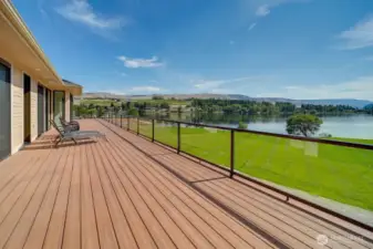 Expansive trex deck with sliding door access from each suite