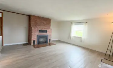 Entry Living Room with Fire place