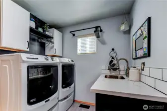 large laundry conveniently located off the garage