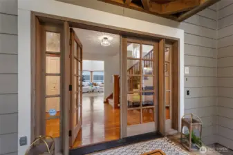 Double doors invite you to gorgeous views from the moment you set foot inside.