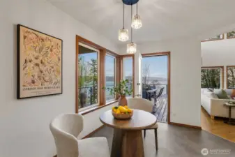 Large eating nook in kitchen...with VIEWS and access to deck!