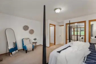 Another view of main floor primary looking onto attached bath.