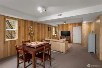 More of the lower level...HUGE storage room behind that door! This area plumbed for kitchenette! More pictures in supplements!