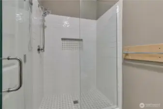 Large walk-in shower in the primary bath ~