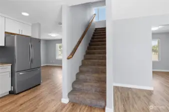 Carpeted staircase to help with absorption of noise.