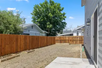 Fully fenced for privacy, this space is ready to become the oasis of your dreams.