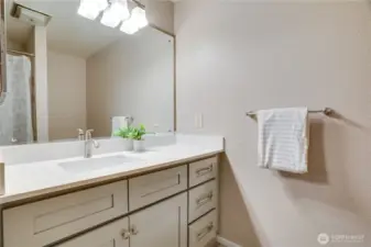 Refreshed and redone hall bathroom with full bathroom for the soaking experience, or daily shower.